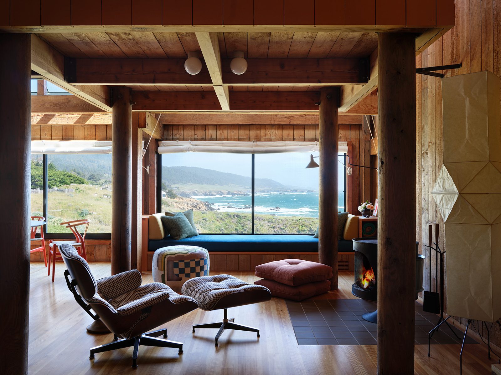 A Sea Ranch interior with a chair facing the ocean