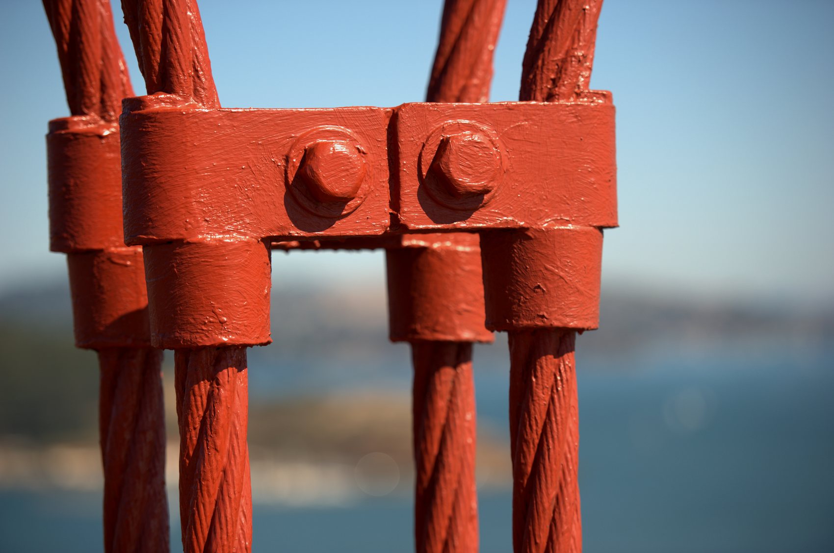 Close view of Golden Gate Bridge cables and clamp