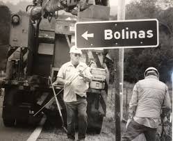 Black and white photograph of a Bolinas road sign