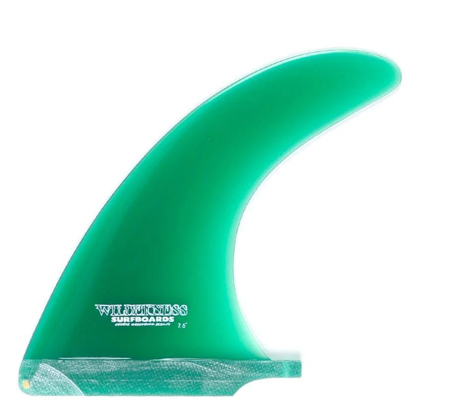 A green tinted Wilderness single surfboard fin by True Ames